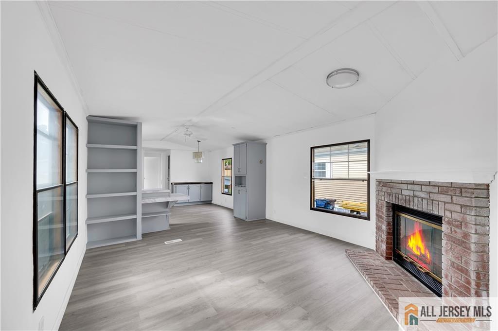 38 Longfellow Road North Brunswick, NJ 08902 - Photo 9 of 23 a view of a livingroom with a fireplace and window