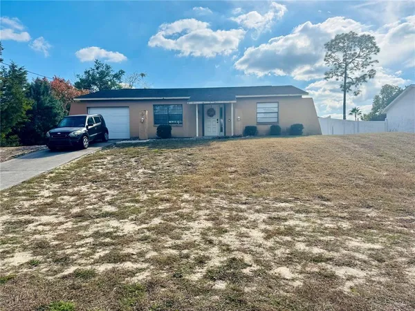 a view of a house with a outdoor space