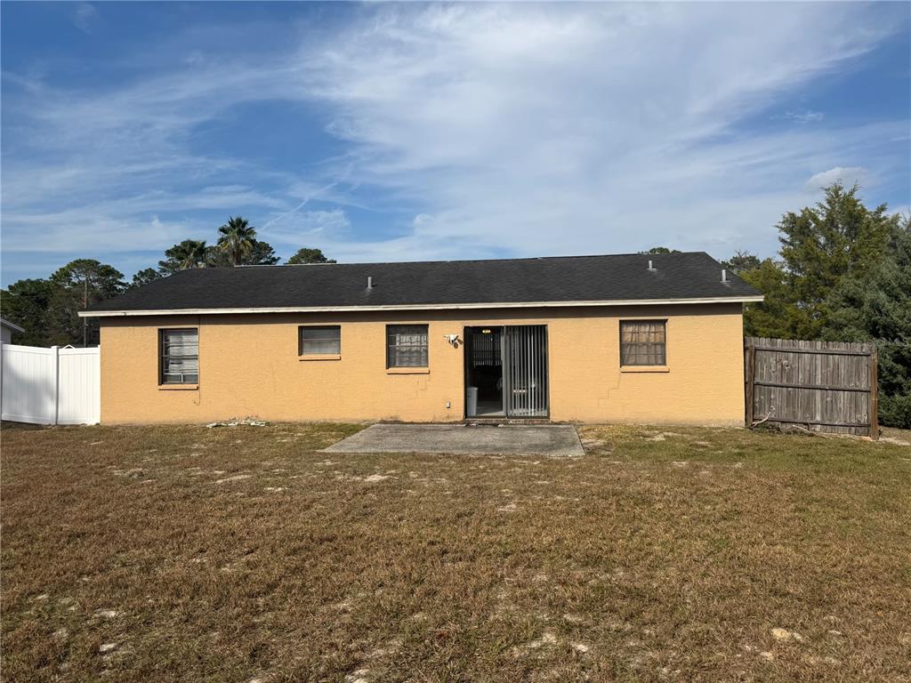13188 Delbarton Street Spring Hill, FL 34609 - Photo 20 of 23 a view of a house with a outdoor space