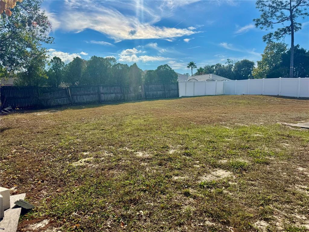 13188 Delbarton Street Spring Hill, FL 34609 - Photo 21 of 23 a view of an outdoor space and a yard