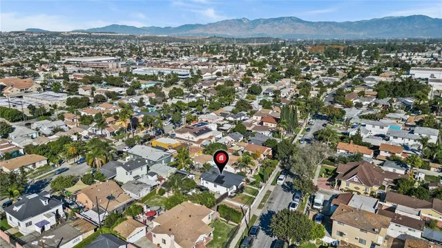 an aerial view of residential house with outdoor space