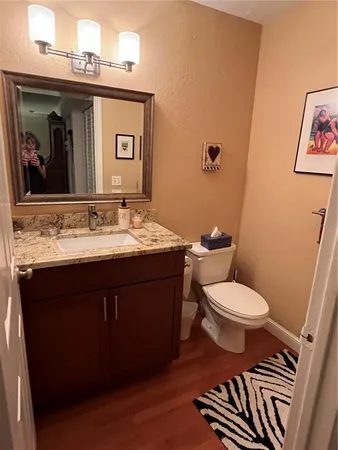 a bathroom with a sink and a toilet