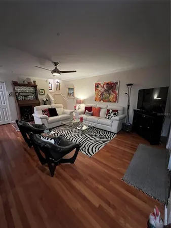 a bedroom with two beds and a tv