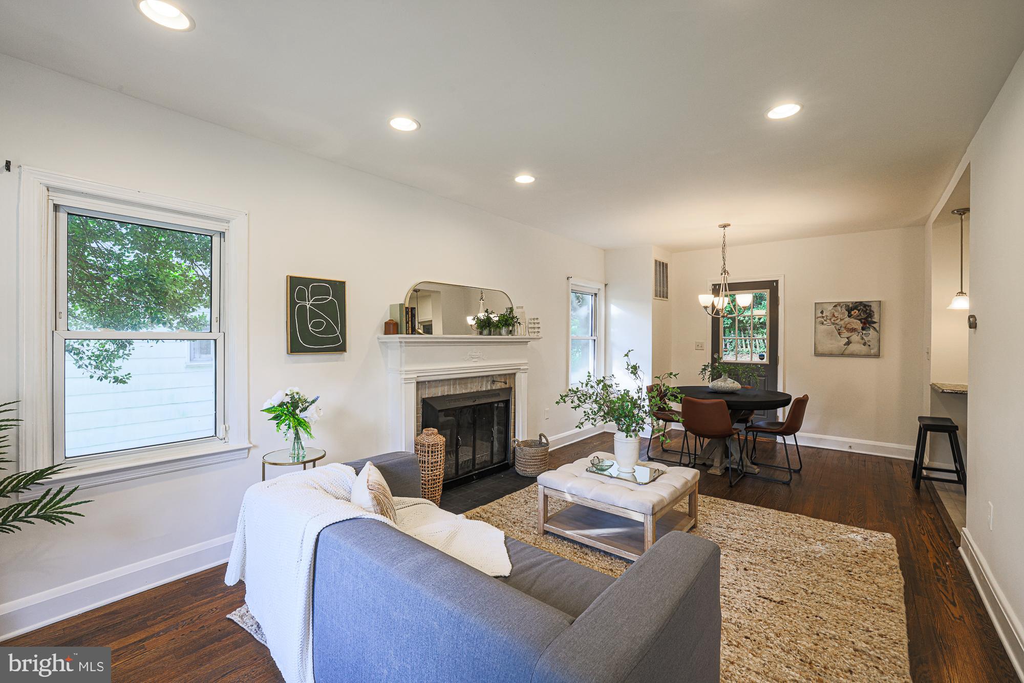 410 Kingston Road Baltimore, MD 21229 - Photo 6 of 56 Living and Dining room with fireplace