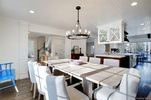 a view of a dining room and chandelier