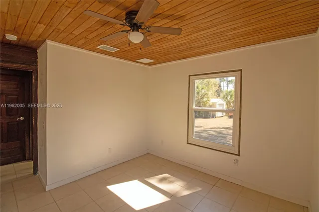 a view of a room that has a window