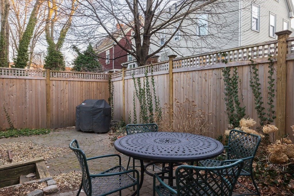 32 Brook Street, Unit 32 Brookline, MA 02445 - Photo 19 of 20 a view of a chairs and table in the patio