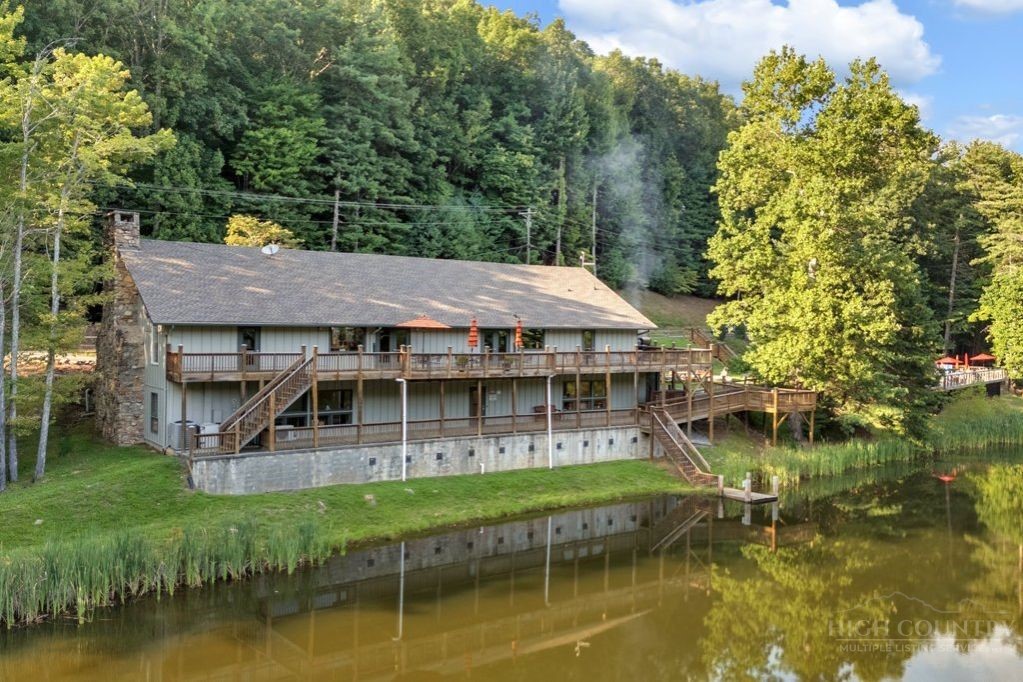 216 Saddle Lane Deep Gap, NC 28618 - Photo 37 of 44 a view of a house with pool