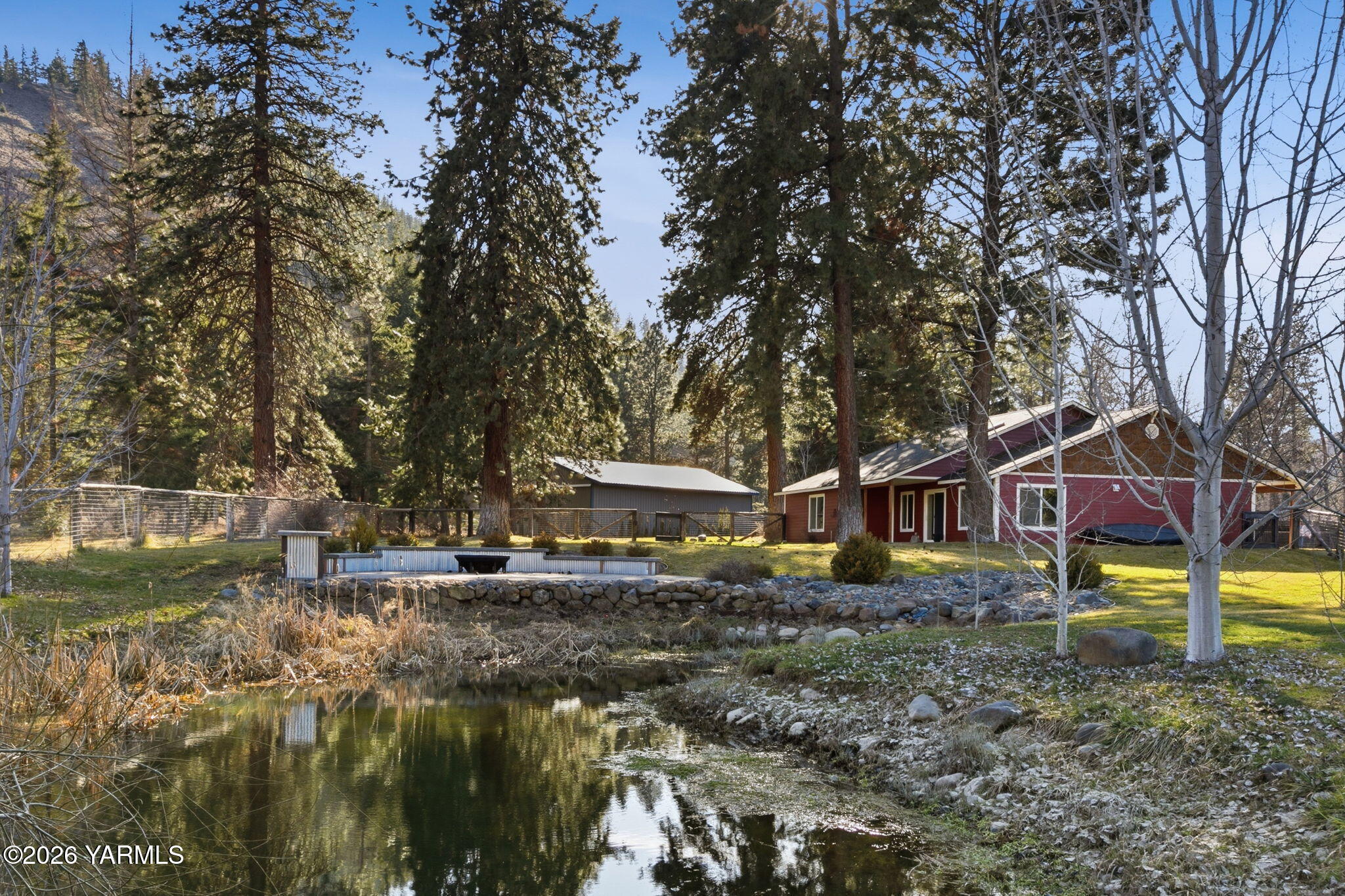 121 Rattlesnake Lane Naches, WA 98937 - Photo 31 of 44 Enjoy the firepit next to the pond!