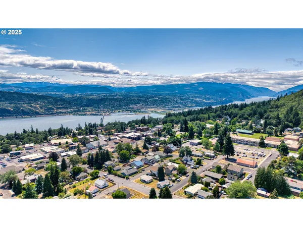 a view of a car parked in front of a house
