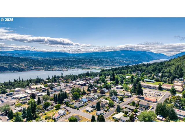 a view of a car parked in front of a house