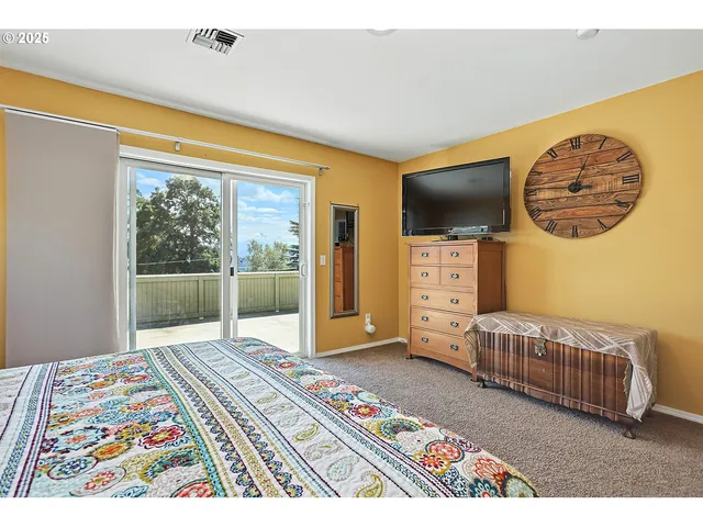a view of a house with a yard porch and sitting area