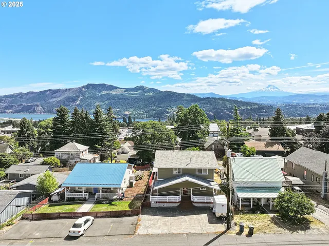 a view of a city with lots of trees