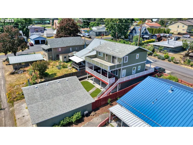 an aerial view of a house with a garden