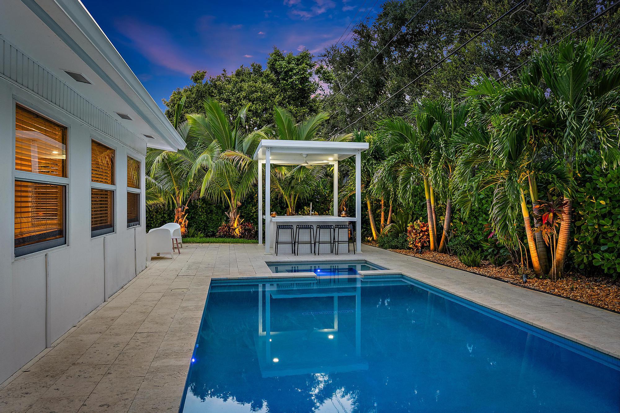 570 Dover Road Tequesta, FL 33469 - Photo 26 of 45 Pool & Back Exterior