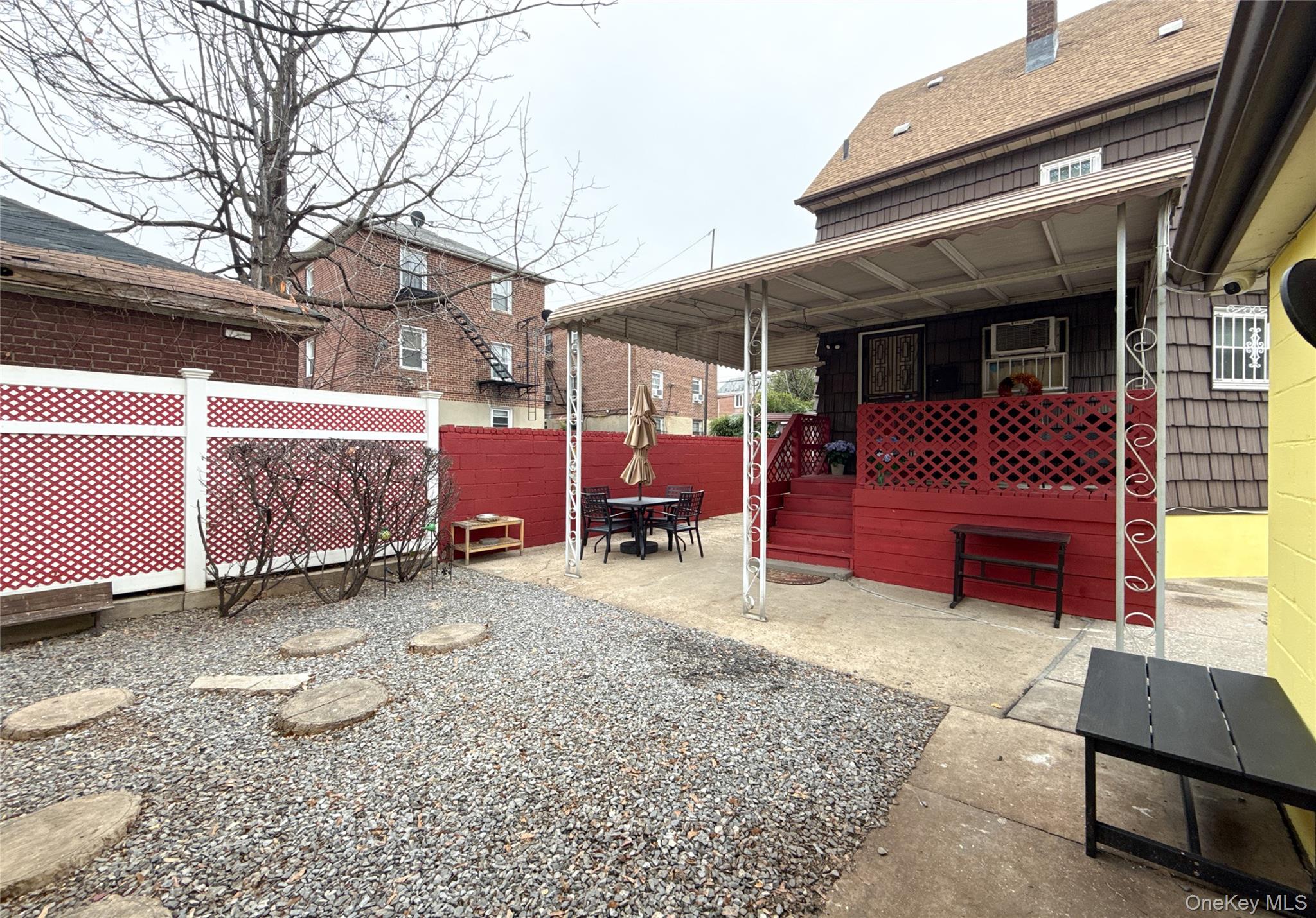 134-37 58th Road Queens, NY 11355 - Photo 6 of 24 View of yard featuring a patio