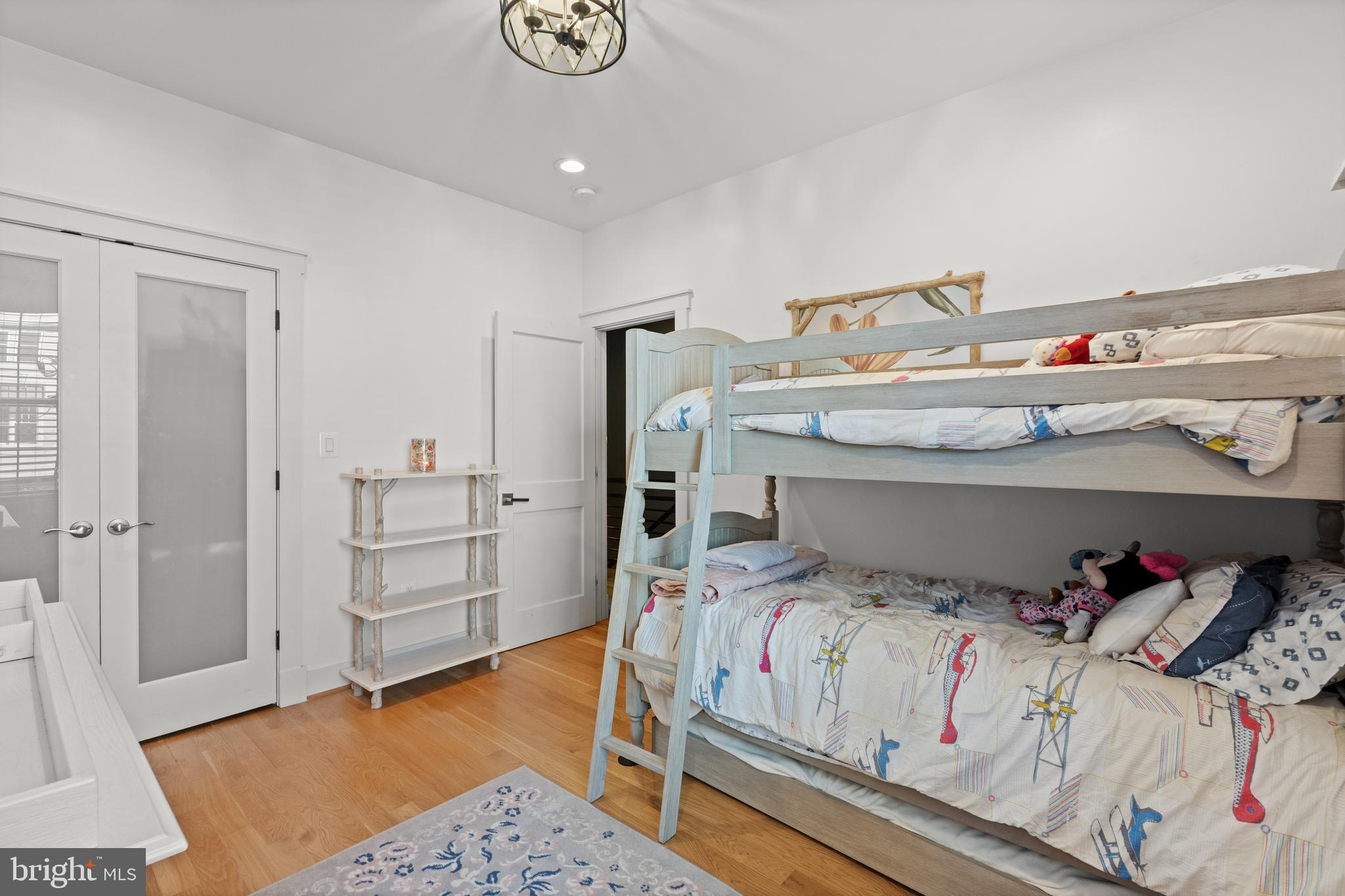 4718 15th Street Northwest Washington, DC 20011 - Photo 24 of 49 a bedroom with a bed and closet