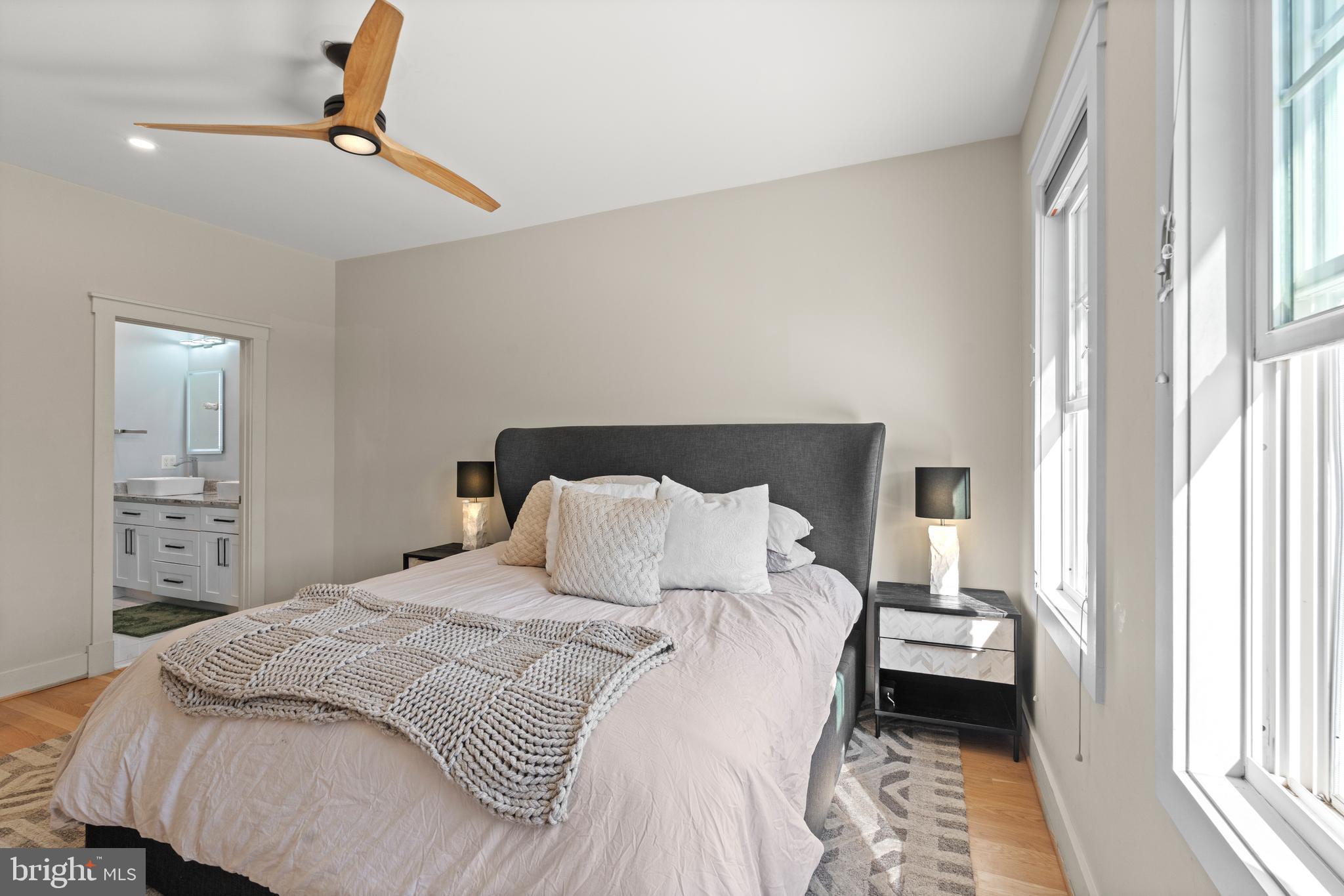 4718 15th Street Northwest Washington, DC 20011 - Photo 30 of 49 a bedroom with a bed and a window