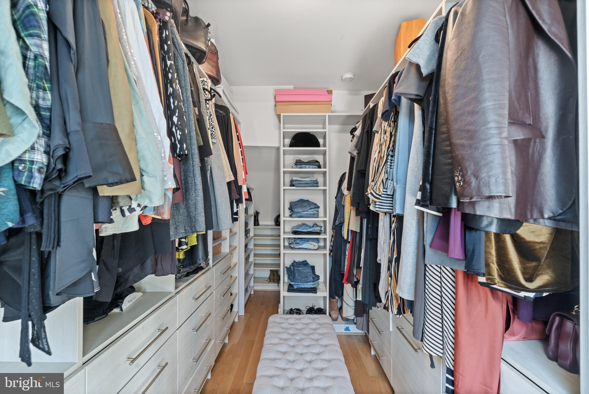 4718 15th Street Northwest Washington, DC 20011 - Photo 34 of 49 a view of walk in closet with clothes and shoes