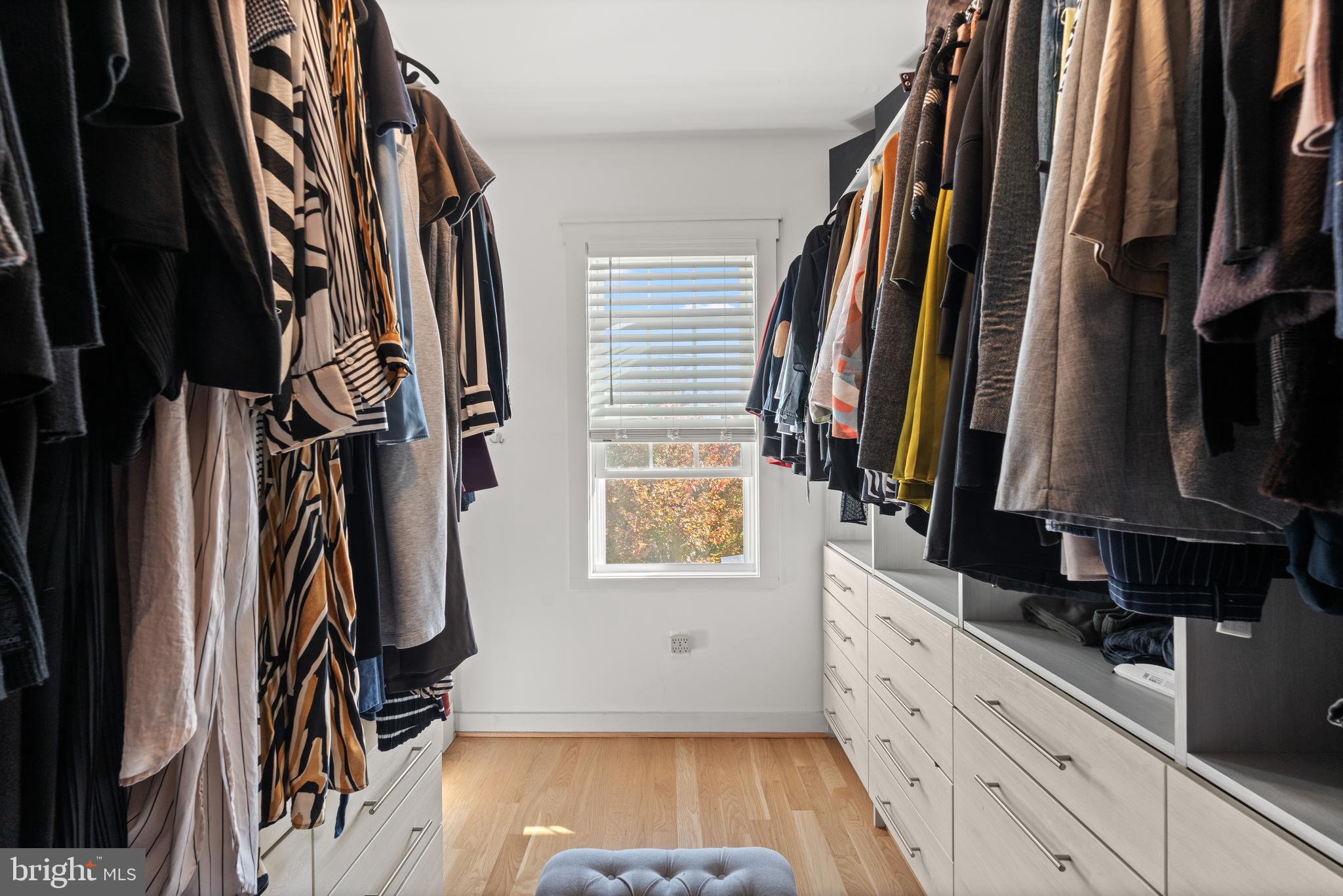 4718 15th Street Northwest Washington, DC 20011 - Photo 35 of 49 a view of walk in closet with clothes and shoes