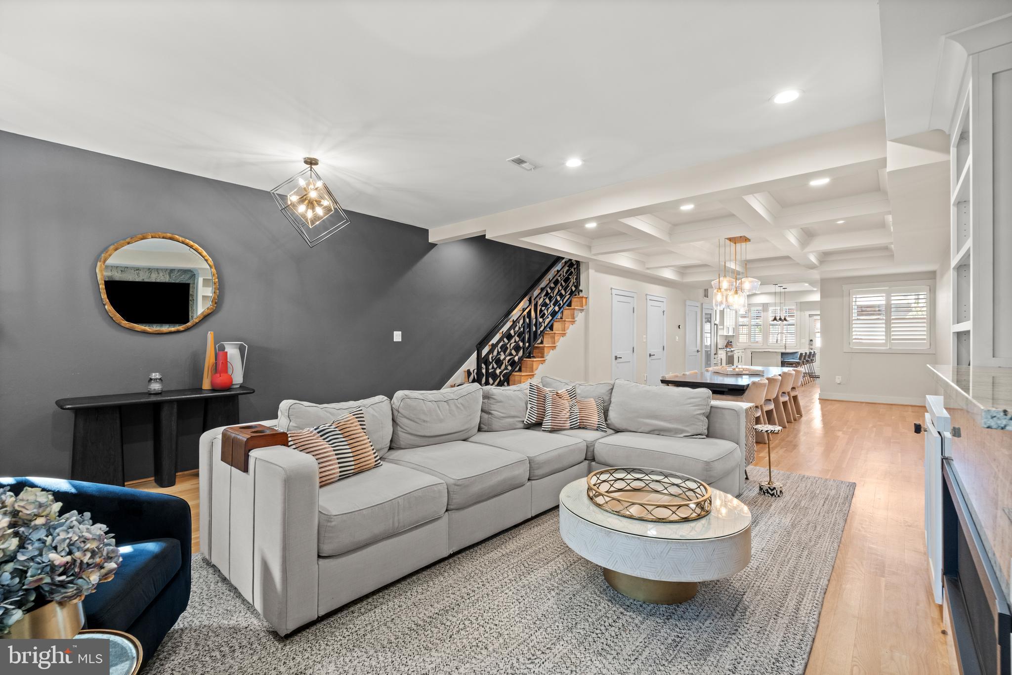 4718 15th Street Northwest Washington, DC 20011 - Photo 6 of 49 a living room with furniture and a fireplace