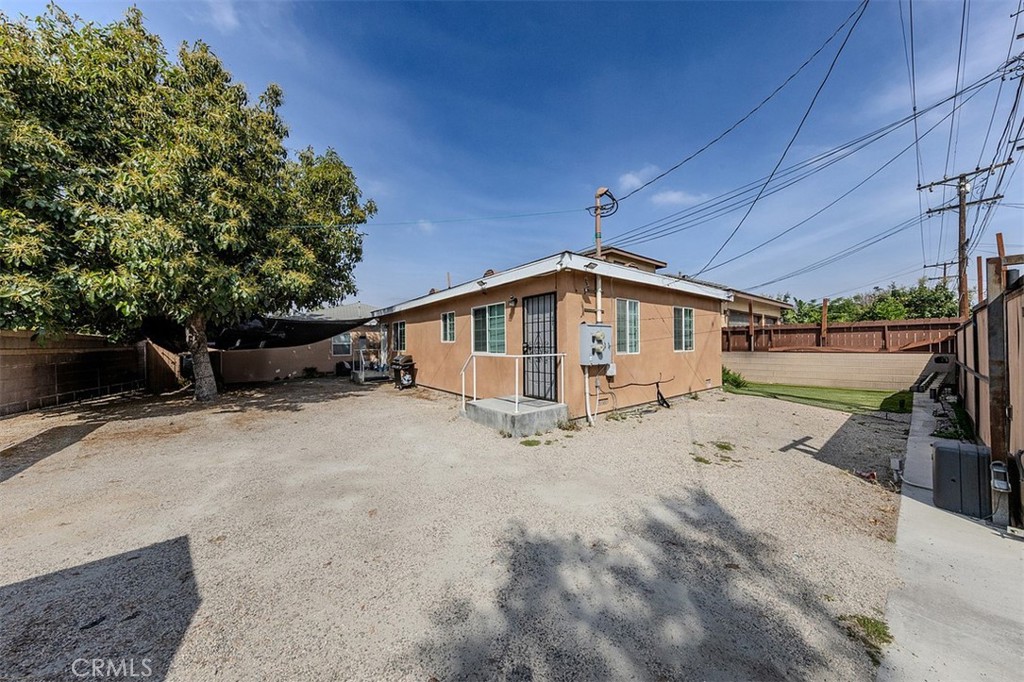 10952 Rose Street Stanton, CA 90680 - Photo 29 of 34 a view of a house with a yard