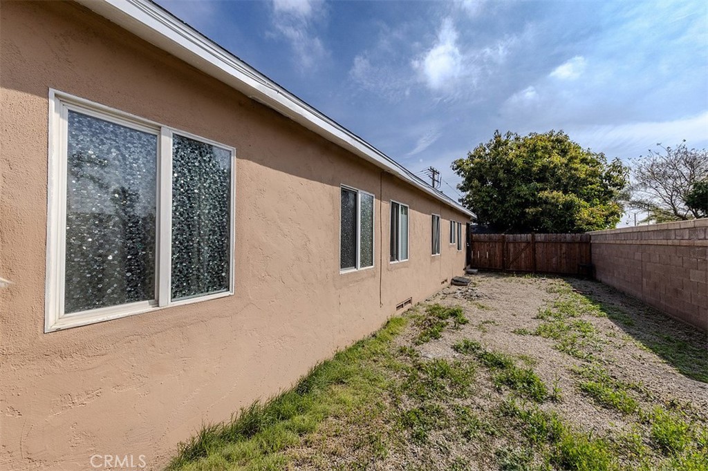 10952 Rose Street Stanton, CA 90680 - Photo 32 of 34 a front view of house with yard