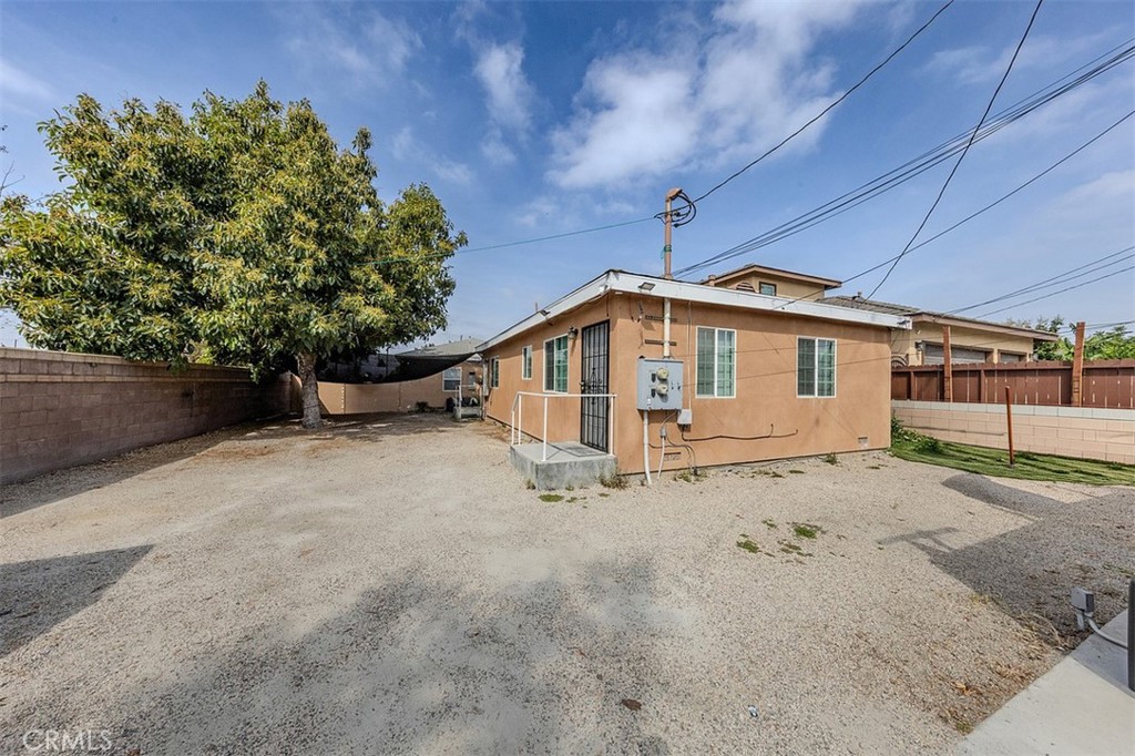 10952 Rose Street Stanton, CA 90680 - Photo 34 of 34 a view of a house with a yard