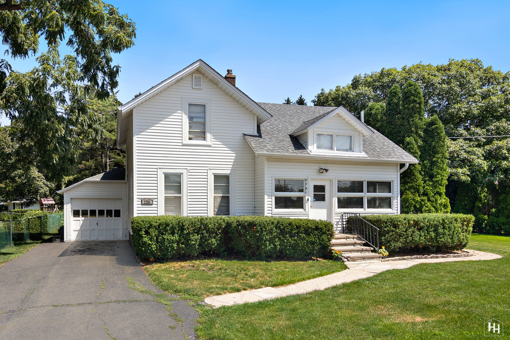2761 Prairie Road Buffalo Grove, IL 60089 - Photo 1 of 23 a front view of a house with a yard