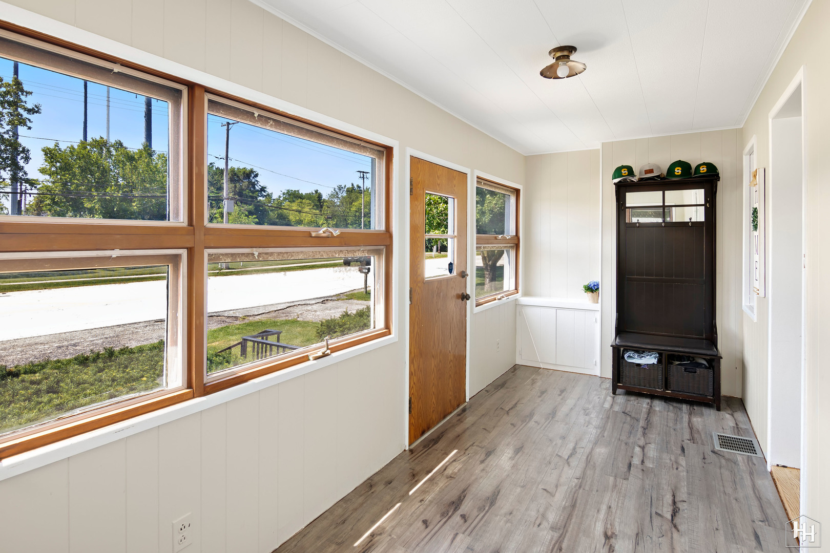 2761 Prairie Road Buffalo Grove, IL 60089 - Photo 12 of 23 a view of a kitchen with furniture wooden floor and a window