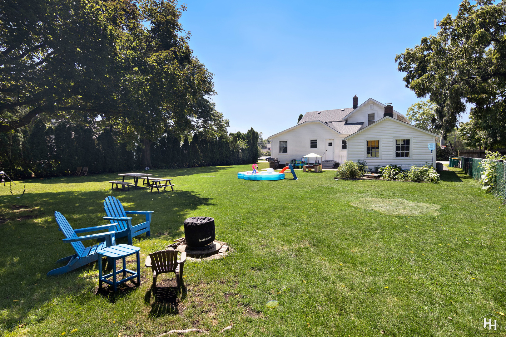 2761 Prairie Road Buffalo Grove, IL 60089 - Photo 22 of 23 a view of a house with a yard porch and sitting area