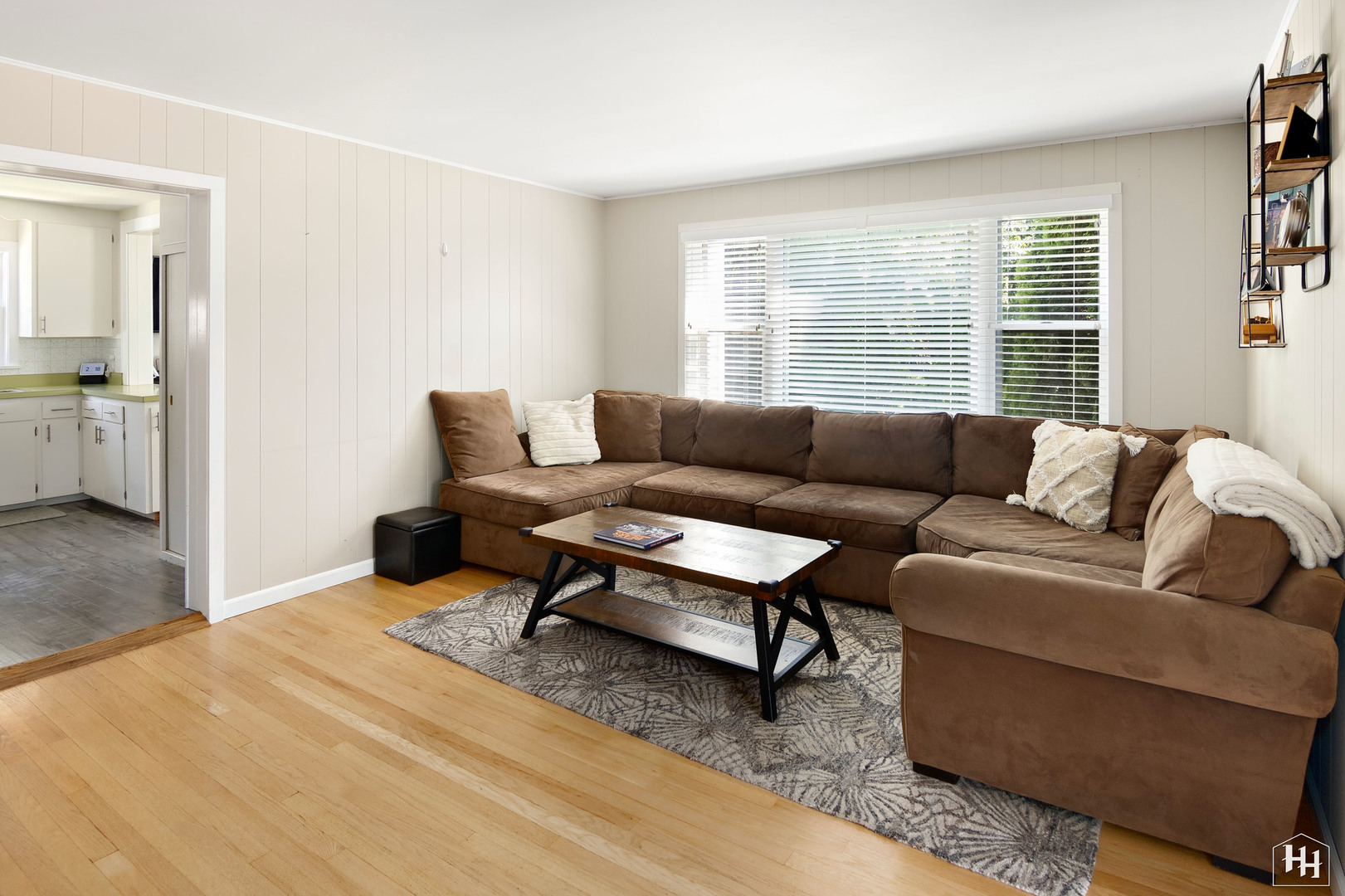 2761 Prairie Road Buffalo Grove, IL 60089 - Photo 7 of 23 a living room with furniture and a large window