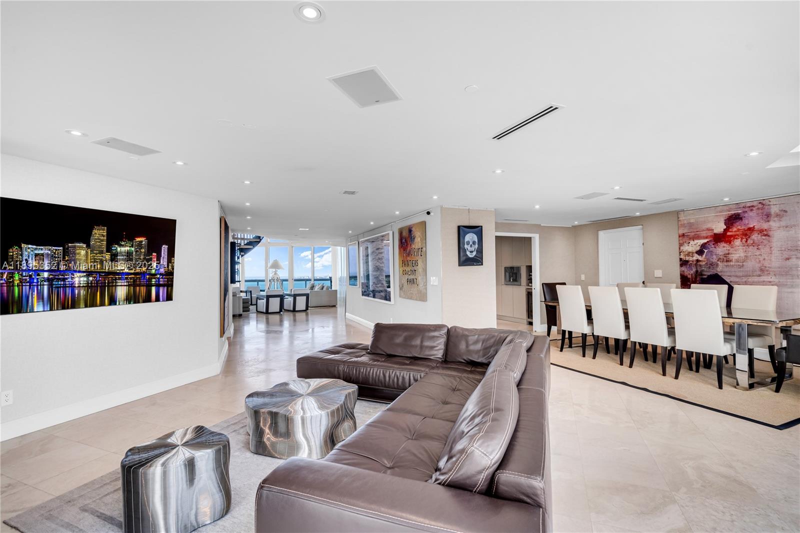 1643 Brickell Avenue, Unit 3501 Miami, FL 33129 - Photo 13 of 91 a living room with furniture and a bookshelf