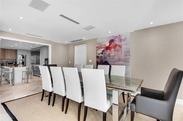 a bedroom with a large bed and a couch