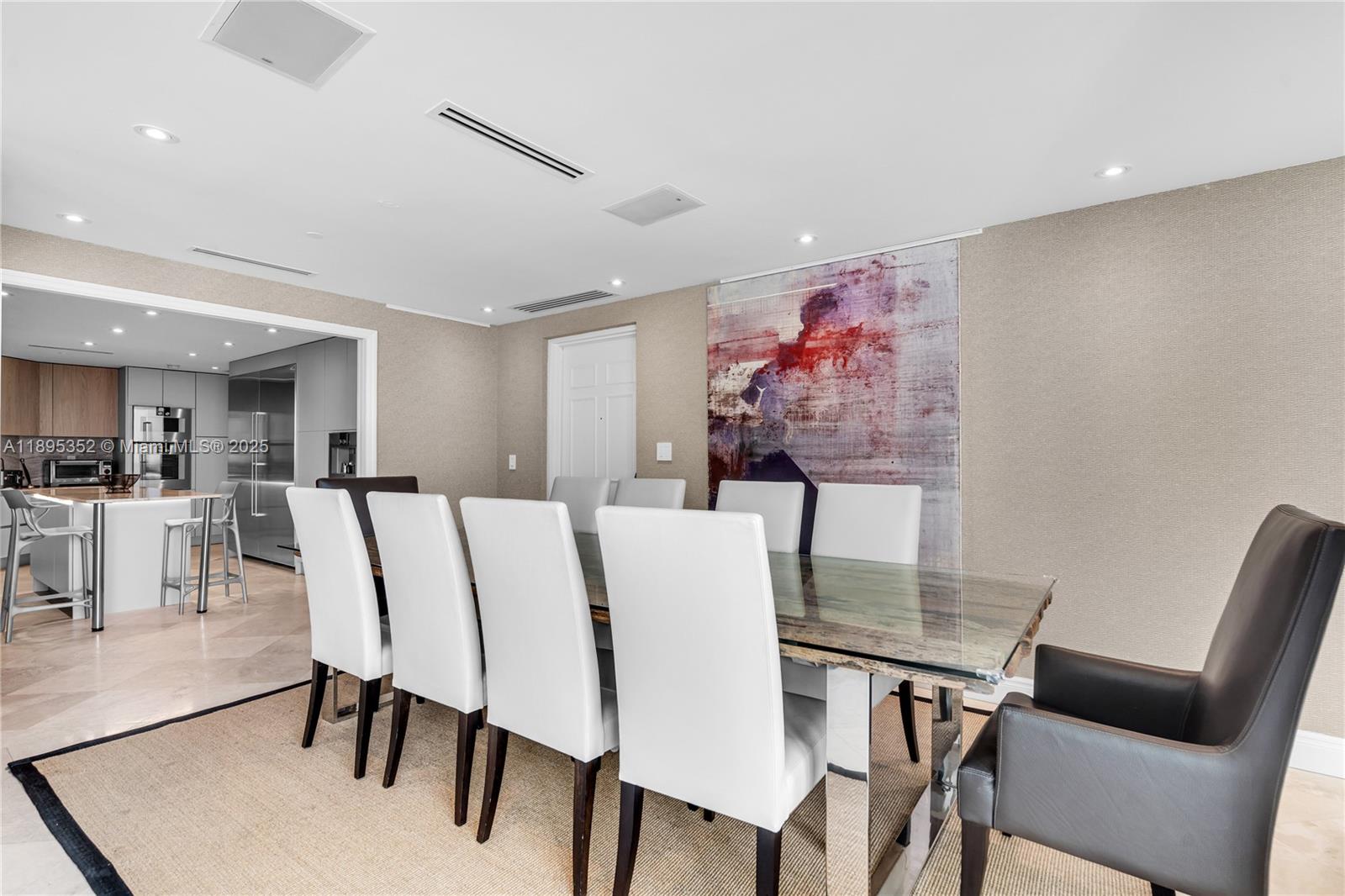 1643 Brickell Avenue, Unit 3501 Miami, FL 33129 - Photo 18 of 91 a view of a dining room with furniture and wooden floor