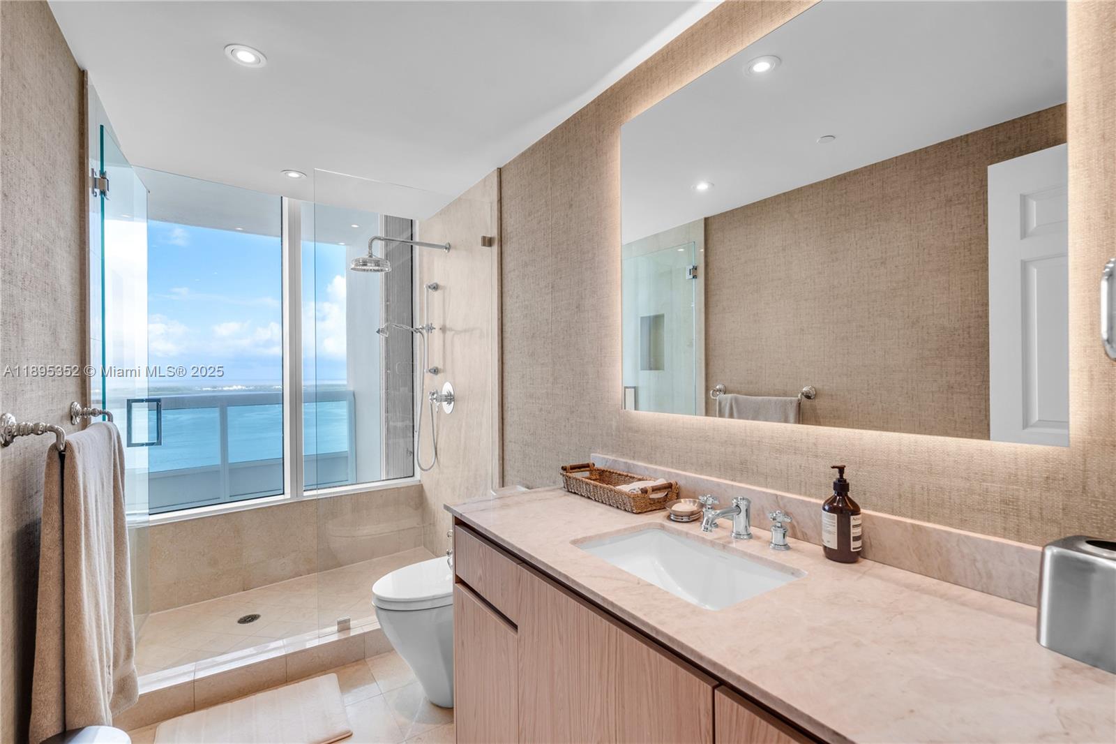 1643 Brickell Avenue, Unit 3501 Miami, FL 33129 - Photo 44 of 91 a bathroom with a sink a toilet and shower