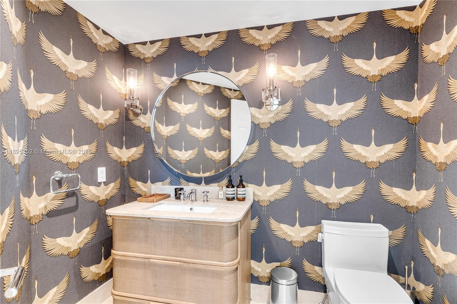 1643 Brickell Avenue, Unit 3501 Miami, FL 33129 - Photo 50 of 91 a bathroom with a sink and mirror