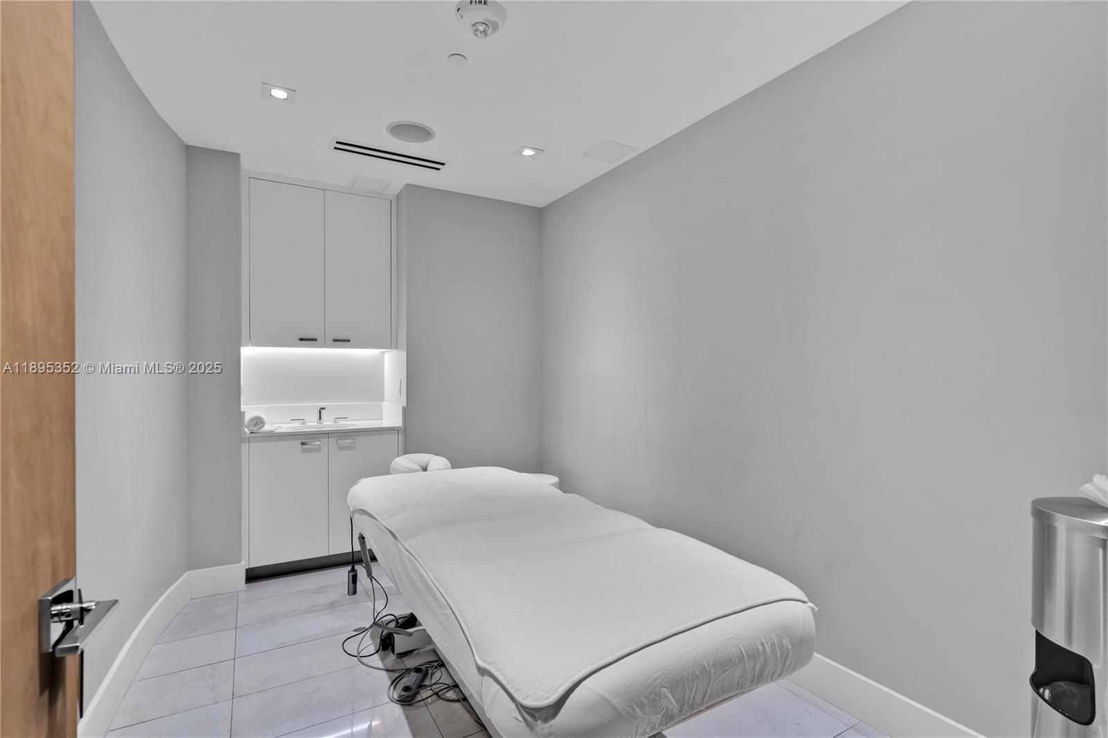 1643 Brickell Avenue, Unit 3501 Miami, FL 33129 - Photo 63 of 91 a bedroom with a bed and a cabinets