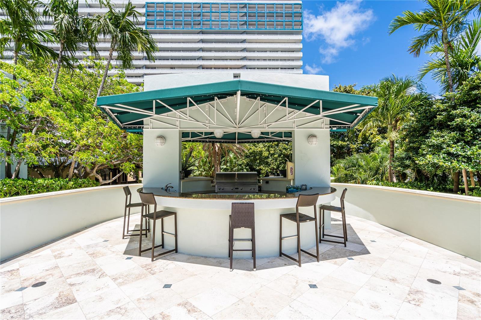 1643 Brickell Avenue, Unit 3501 Miami, FL 33129 - Photo 70 of 91 a view of a chairs and table in the patio