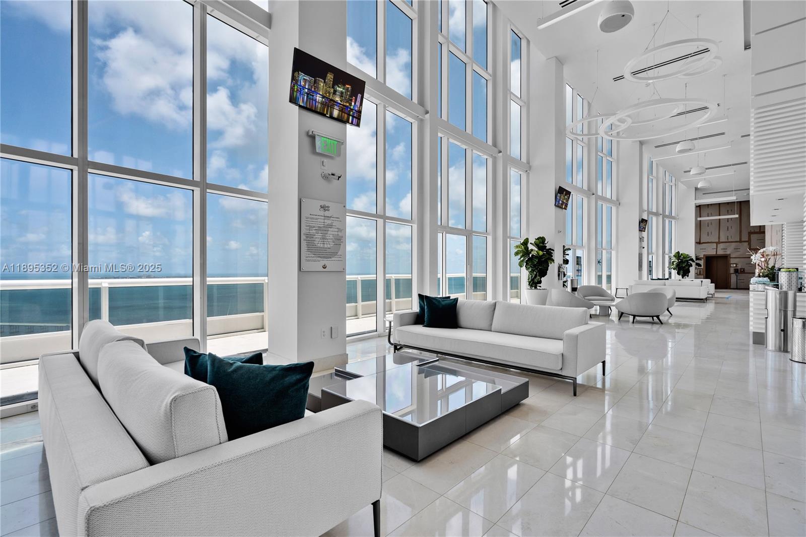 1643 Brickell Avenue, Unit 3501 Miami, FL 33129 - Photo 75 of 91 a living room with furniture and a large window