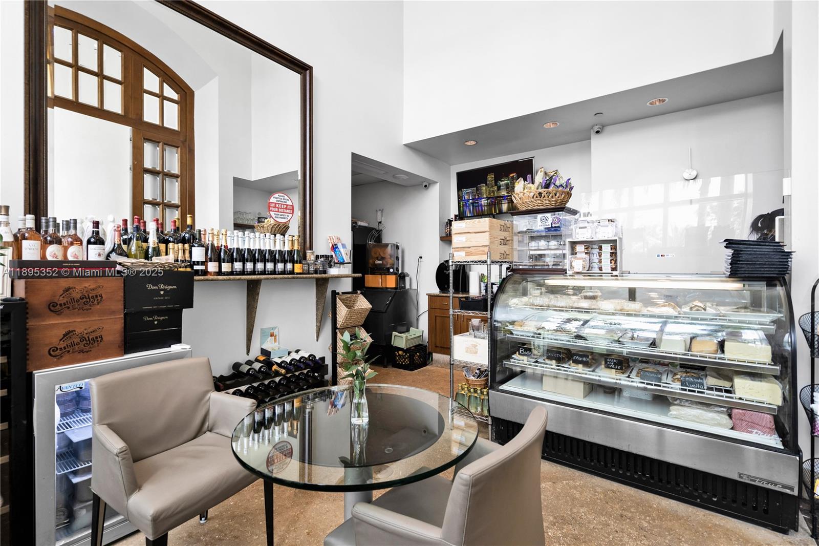 1643 Brickell Avenue, Unit 3501 Miami, FL 33129 - Photo 81 of 91 a kitchen with a table chairs stove and cabinets