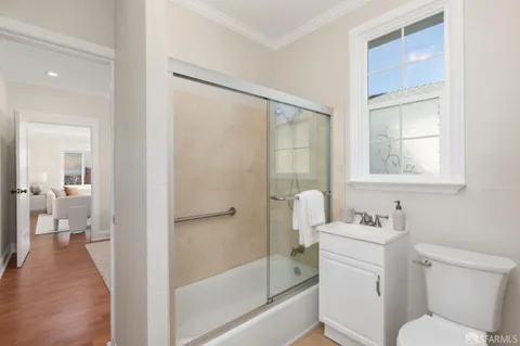 a view of a chair and table in the garden