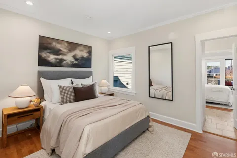 a view of a pathway with a tree