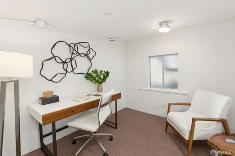 a front view of house with a yard