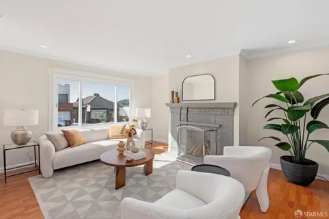 a living room with furniture and a table