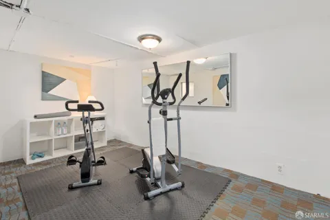 a view of a street with a building in the background