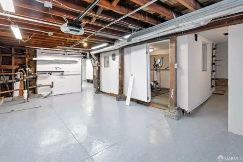 a front view of a house with parking space