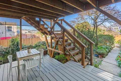 a view of a road with a building in the background