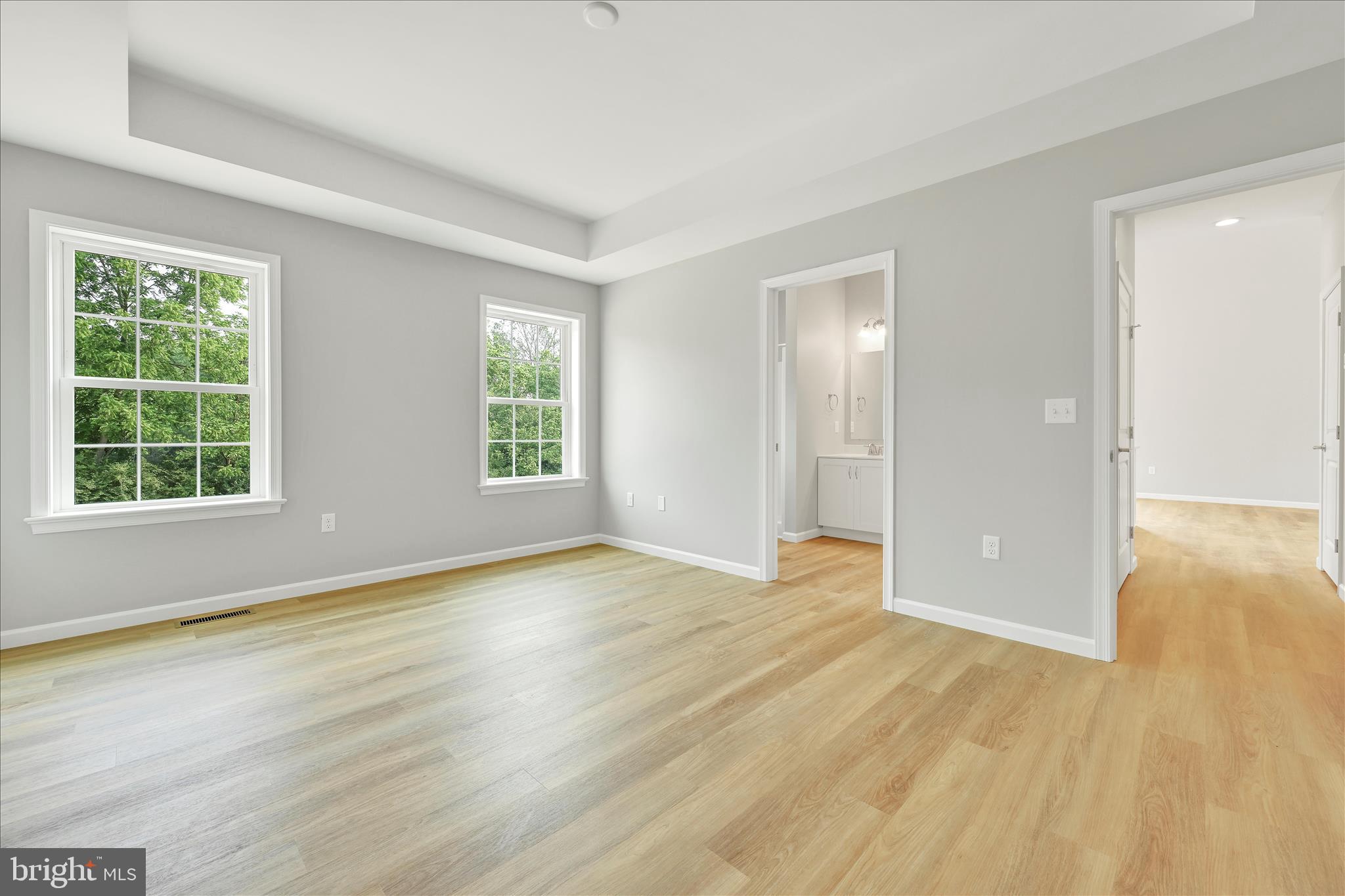 227 Pilgrim Drive Lancaster, PA 17603 - Photo 12 of 24 a view of an empty room with wooden floor and a window