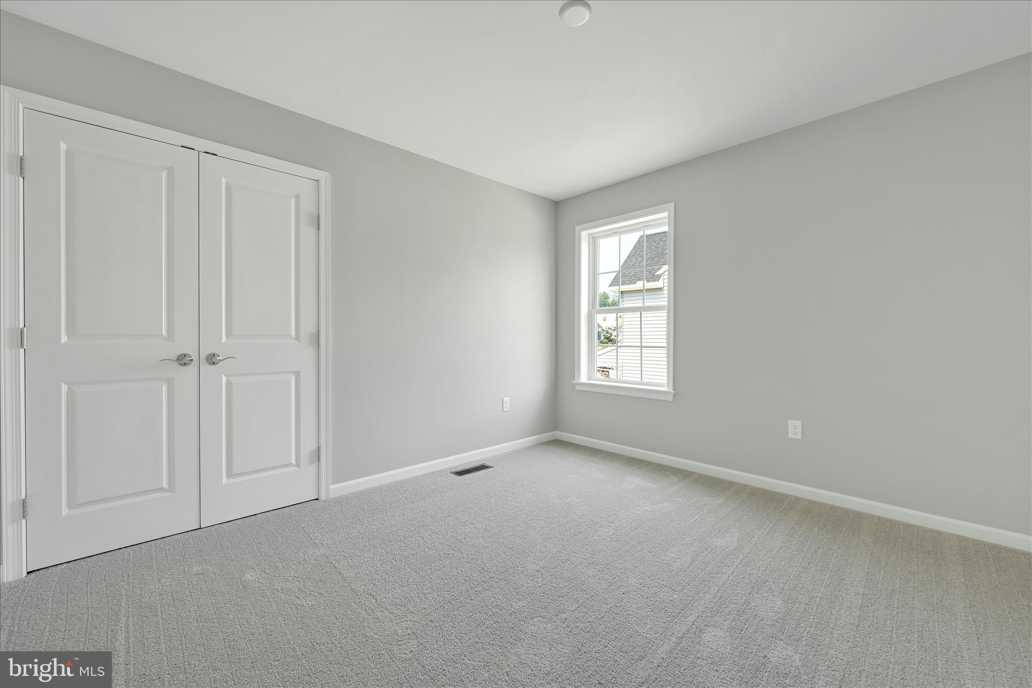 227 Pilgrim Drive Lancaster, PA 17603 - Photo 20 of 24 a view of an empty room with a window